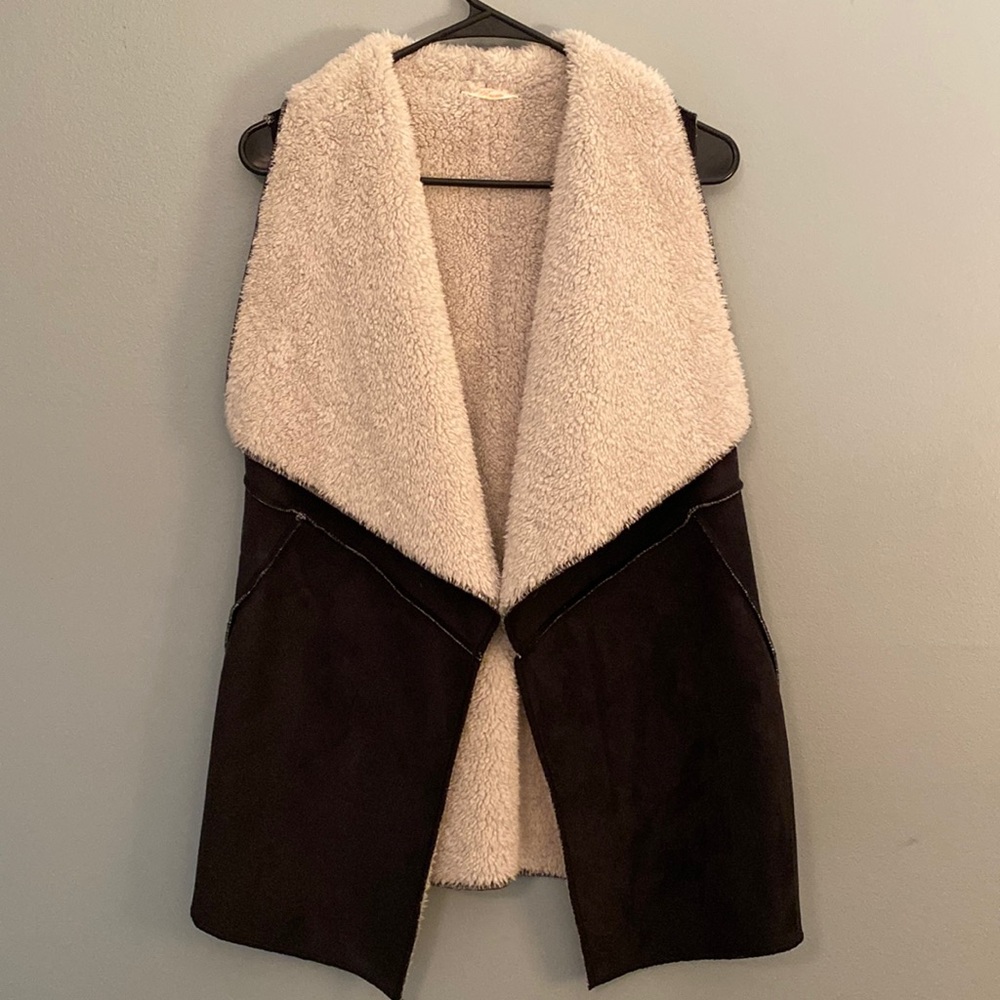 Black faux suede fleece lined vest.